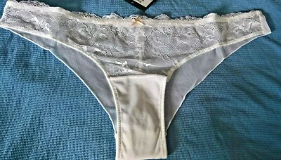 Bragas brasileñas de encaje blanco Foto 1 de 4