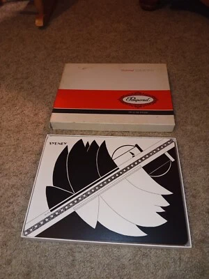 Colchonetas de corcho vintage raras Pimpinela "Sydney" firmadas Susan George caja original Foto 1 de 4