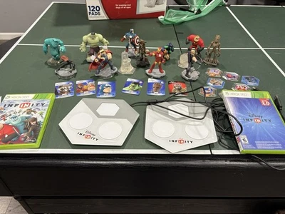 Lote Disney Infinity con 18 figuras + 2 bases + juegos Xbox 360 (1.0 y 2.0) Foto 1 de 4