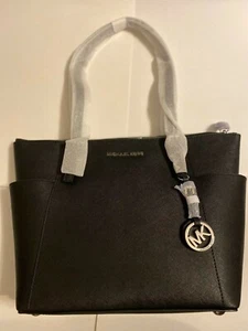 Nuevo Bolso de Mano Michael Kors Jet Set EW TZ Negro con Bolsillos Laterales Plateados - Imagen 1 de 11