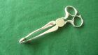 Antique sterling silver sugar tongs