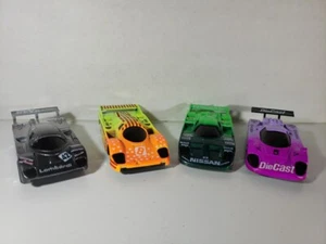 Le Mans Race Cars Set/4 Porsche Sauber Nissan Jag Deicast Pull Back Rubber Tires - Picture 1 of 8