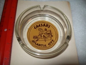 CAESARS RESORT,ATLANTIC CITY,NJ CLEAR GLASS ASHTRAY-CAESAR EATING GRAPES - Picture 1 of 2