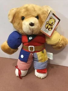 Neu mit Etikett Vintage KellyToy sensorischer mehrfarbiger Stofftier Teddybär mit Druckknöpfen & Reißverschlüssen - Bild 1 von 7