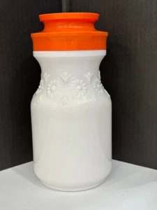 Vintage Milk Glass Tang Jar Canister Embossed Daisies Orange Plastic Lid - Picture 1 of 8
