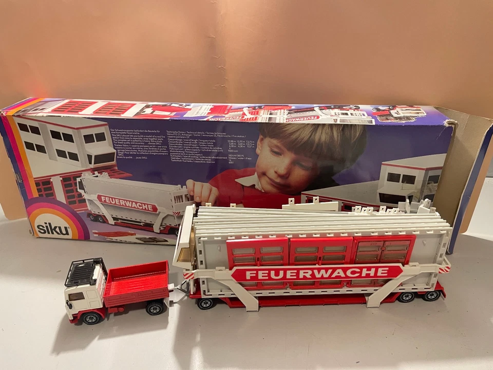 Siku 4015 Feuerwache Volvo F12 mit Tieflader neu 1:55 OVP Box Super Rarität  - Bild 1 von 4