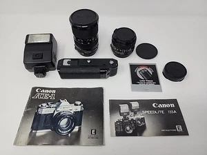 Canon AE-1 Accessories: Manuals, Lenses (28 + 35-70mm), Power Winder *No Camera* - Picture 1 of 23