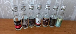 Limited Edition 7 miniature Rum Glass bottles 20ml each Empty .Great for display - Picture 1 of 2