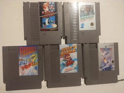 Nintendo NES Games Mario 1 and 2 Cobra Triangle Rad Racer Top Gun Tested - Image 1 of 4