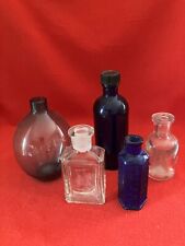 Vintage small glass bottles, collection of 5 including 1 poison. 