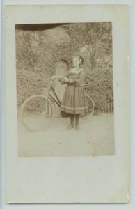 POSTCARD Young woman with bicycle, RPPC - Picture 1 of 2