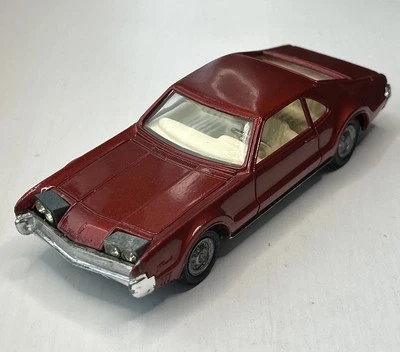 CORGI 276 OLDSMOBILE TORONADO METALLIC BROWN WITH GOLDEN JACKS VINTAGE 1968-72 - Image 1 of 4
