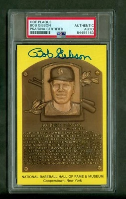 Bob Gibson Autographed Yellow Hall of Fame Plaque Postcard PSA/DNA  - Image 1 of 2
