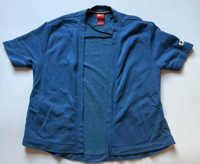 Cárdigan relajado de gran tamaño abierto para mujer Nike manga corta verde azulado talla pequeña Foto 1 de 4