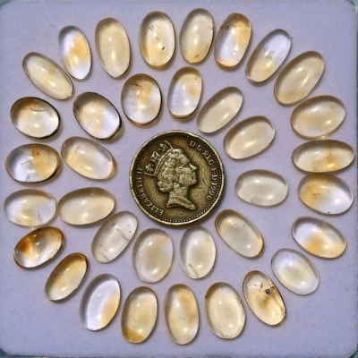Wholesale 35 Pcs Natural Citrine Untreated 12-14.8mm Oval Cabochon Gemstones Lot - Image 1 of 4