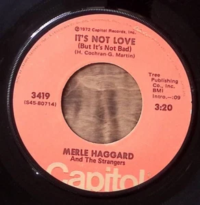 MERLE HAGGARD & THE STRANGERS MY WOMAN KEEPS LOVIN' HER MAN/IT'S..VINYL 45 59-23 - Picture 1 of 3