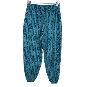 Vintage 90s Surf Odyssey Pants Size Small Baggy Muscle Turquoise Loud Print - Picture 1 of 7