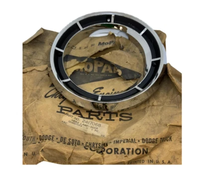 1964 Dodge Polara Right Passenger Side Outer Headlight Bezel 2417068 NOS. - Image 1 of 4