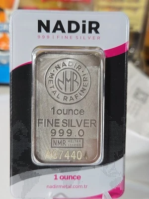 NADIR METAL REFINER BARRA DE PLATA FINA .999 DE UNA ONZA EN TARJETA DE ENSAYO SIN ABRIR Foto 1 de 2