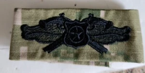 U.S. NAVY BADGE, CLOTH, NWU III, WOODLAND, SECURITY FORCES SPECIALIST - Picture 1 of 1