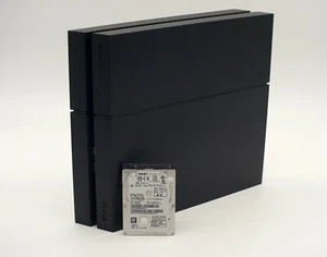 Sony Playstation 4 Reparatur - Austausch 1TB Festplatte einbauen PS4 - Bild 1 von 2