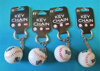 FOUR (4) TAMPA BAY RAYS PLASTIC, BASEBALL KEY CHAINS FROM RICO INDUSTRIES - Image 1 of 2
