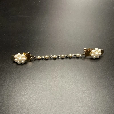 Cárdigan protector suéter vintage tono dorado y perla sintética Foto 1 de 4