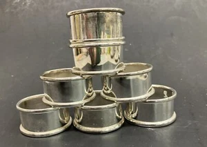 Unbranded Set of 7 Chrome Silver Tone Round Napkin Ring Holders Metal Preowned - Picture 1 of 8
