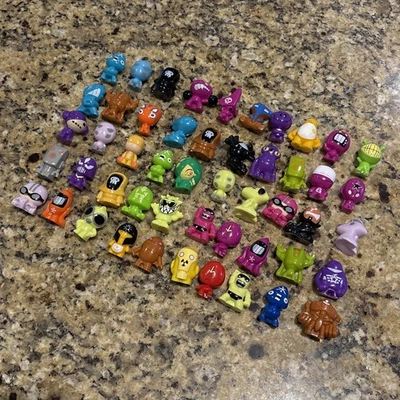 Gogos Crazy Bones Lot of 50 Series 1 Mixed Colors #5 - Image 1 of 4