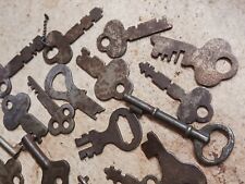 22 Antique Keys Of Varying Sizes And Styles.