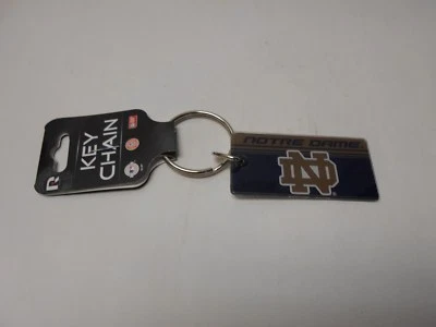 2 Notre Dame Fighting Irish Acrylic Key Chain. 2-3/8" x 1-1/4".   N114/495A - Image 1 of 2