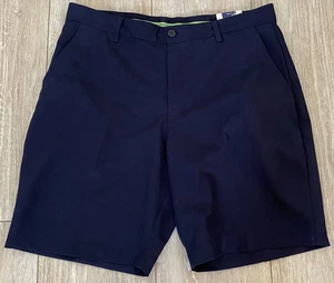 IZOD PANTALONCINI DA GOLF UOMO VESTIBILITÀ CLASSICA FLAT FRONT COLORE NAVY TAGLIA 34W NUOVI - Foto 1 di 5