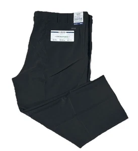 Neu Izod Golf Swingflex Hose Herren schwarz gerade Passform vorne flach Größe 50 x 29 - Bild 1 von 5