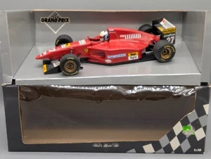 Modellautos 1:18 Minichamps Ferrari 412 T1 #27 N. Larini mit OVP - Bild 1 von 12