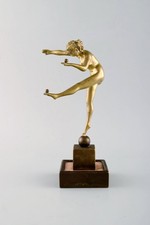 Art deco bronze sculpture. Naked woman juggling balls. 1930s