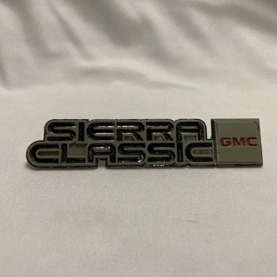Camioneta GMC Sierra 1981-1987 tablero clásico placa de ventilación de CA emblema 14023052 OEM Foto 1 de 4