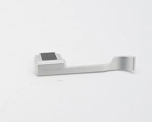 JJC-TA-X100V Silver Metal Thumbs Up Grip for Fujifilm X-100V (#15856) - Picture 1 of 3