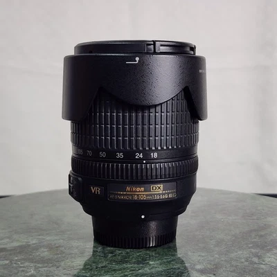 Capa para lente Nikon AF-S DX VR 18-105mm Nikkor f3.5-5.6G ED AF Nikon HB-32 - Imagem 1 de 4