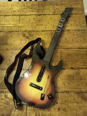 Controlador inalámbrico Guitar Hero Sunburst PS3 95451.805 SIN DONGLE / Cubierta de batería Foto 1 de 4