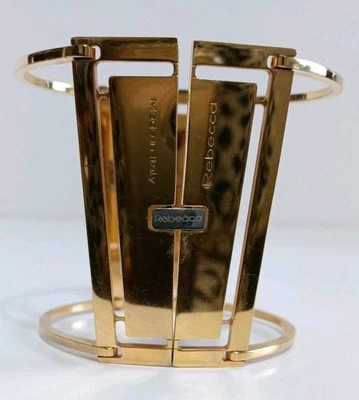 Brazalete geométrico tono dorado Rebecca marco modernista vintage hecho en Italia Foto 1 de 4