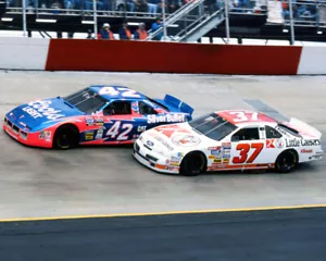 KYLE PETTY & JOHN ANDRETTI RACING ON TRACK AT BRISTOL 8X10 GLOSSY PHOTO #E2 - Picture 1 of 1