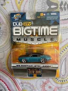 JADA DUB CITY BIGTIME MUSCLE 69 PONTIAC GTO JUDGE ESCALA 1:64 - Imagen 1 de 2