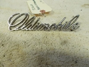 1972 OLDSMOBILE CUTLASS  F-85 4-DOOR SEDAN,   TRUNK EMBLEM,   N-733  E - Picture 1 of 3