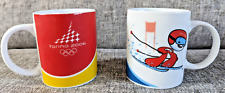 Turin Winter Olympics Mugs Set of Two 2006 Torino Italy Mascot Bobsleigh Skiing