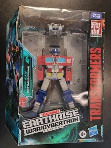 Transformers War For Cybertron Optimus Prime WFC-E11 Unopened SEE PICTURES - Imagen 1 de 8