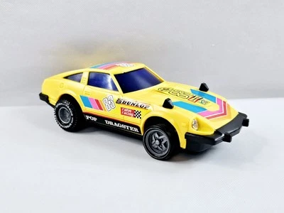 Arco Datsun Nissan Fairlady Z 280Z Yellow Friction Toy Car Pop Dragster Works - Image 1 of 4