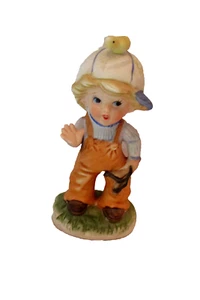 CERAMIC FIGURINE, CHILD WITH SLING SHOT 5 1/2" TALL - Picture 1 of 2