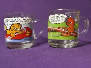 1978 McDonald's Garfield Anchor Hocking Glass Mugs ‘Odie Canoe’ & ‘Seesaw’ Cups - Picture 1 of 18