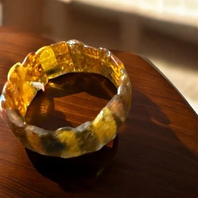 Pulsera ámbar tono oro? Hermosas cuentas elásticas Foto 1 de 4