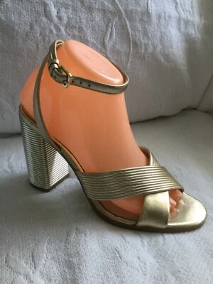 ALDO 8.5 M Gold CrissCross Ankle Wrap Sandal Heels 4 3/4” Chunky Metallic Heel - Image 1 of 4